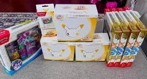 Pokémon TCG 30th Celebration Elite Trainer Box with Nidorina promo and booster packs