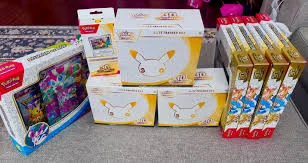 Pokémon TCG 30th Celebration Elite Trainer Box with Nidorina promo and booster packs